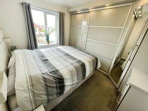 Bedroom One- click for photo gallery